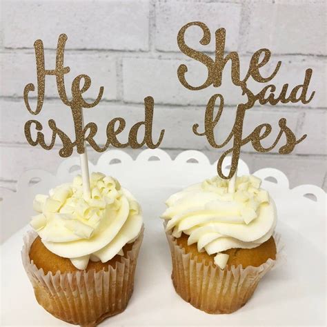 Check out our black and gold cupcake toppers selection for the very best in unique or custom, handmade pieces from our party decor shops. . Cupcake engagement toppers